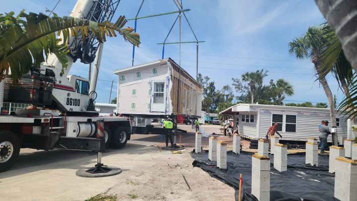 Installing new home at 413 Dije St.<br> Photos by Dan Mclean - Slide 13 width=